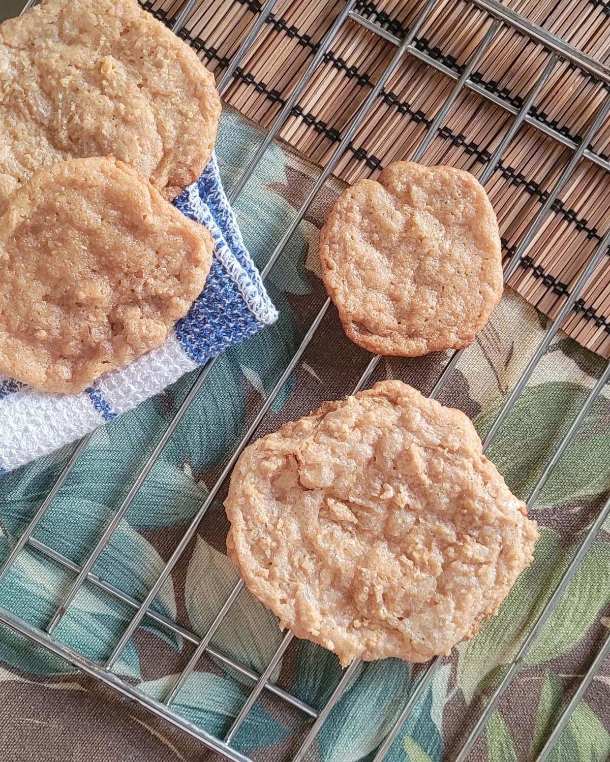 Finished peanut butter cookies cooling on a wire rack